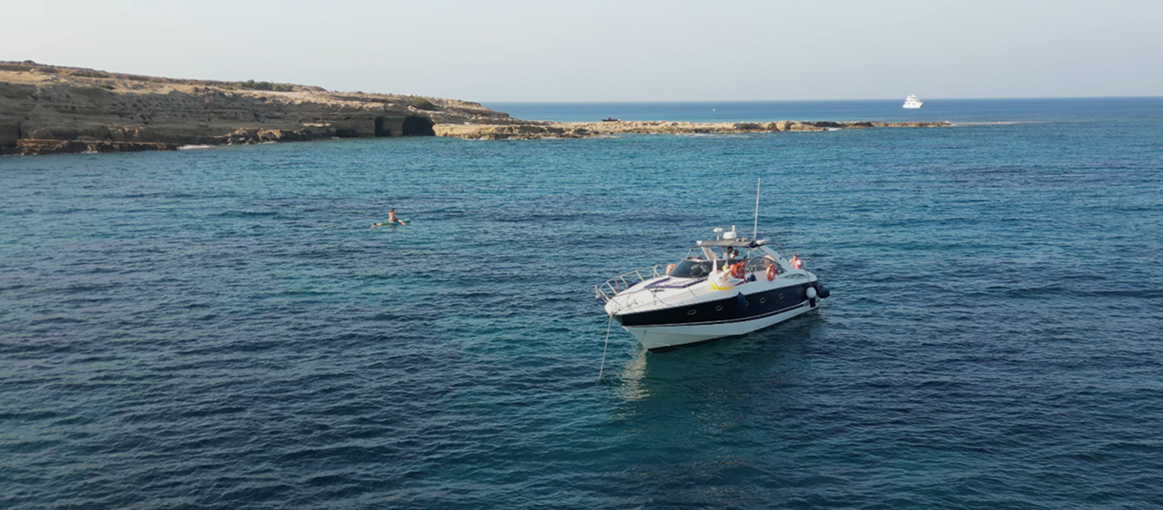Smart Yacht Cyprus – yacht anchored in crystal-clear Mediterranean waters