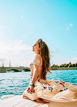 Smart Yacht Cyprus – elegant woman enjoying a yacht charter